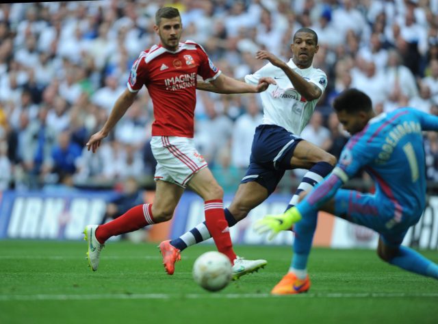 Preston North End's Jermaine Beckford scores his third goal against Swindon (Daniel Hambury/PA)