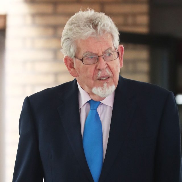 Rolf Harris leaves court after prosecutors said they will not seek a second retrial (Gareth Fuller/PA)