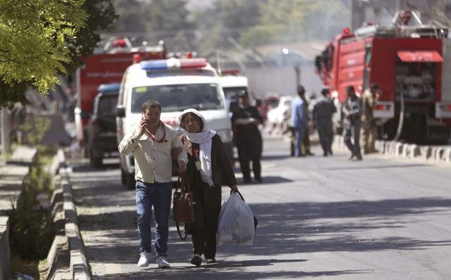 (Massoud Hossaini/AP)