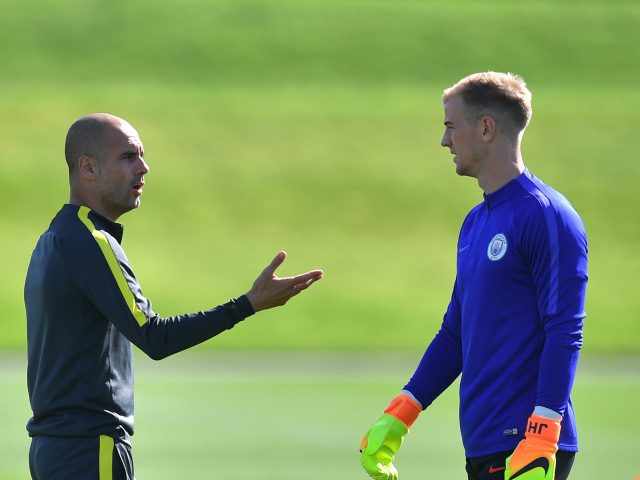 Pep Guardiola and Joe Hart (PA)