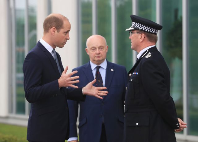 The Duke of Cambridge is greeted by Chief Constable Ian Hopkins as he arrives at the headquarters of Greater Manchester Police (Danny Lawson/PA)