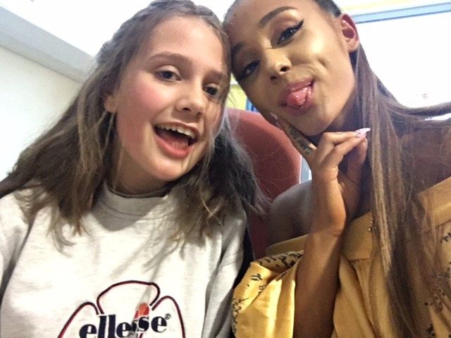 Evie Mills with Ariana Grande