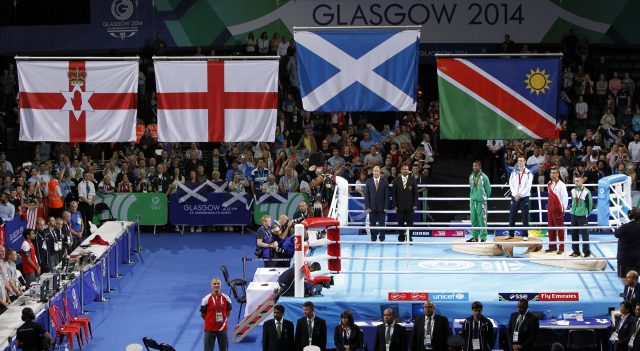 Scotland's Josh Taylor receives his gold medal during the 2014 Commonwealth Games