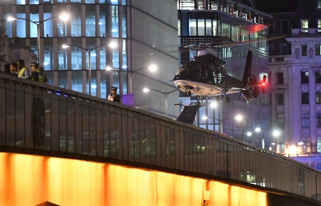 A helicopter lands on London Bridge