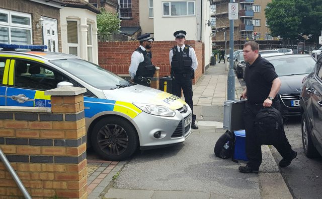 Police outside the house in Ilford