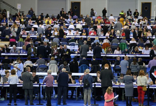 Ballot papers being counted at the Emirates Arena in Glasgow (Andrew Milligan/PA)