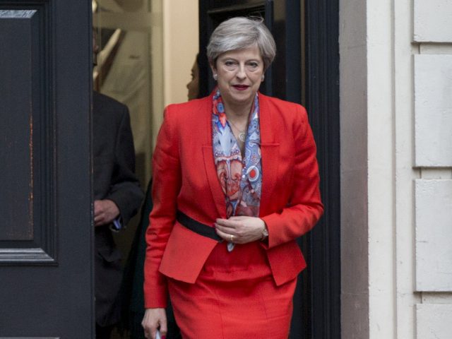 Theresa May to form new government despite losing majority in United Kingdom election