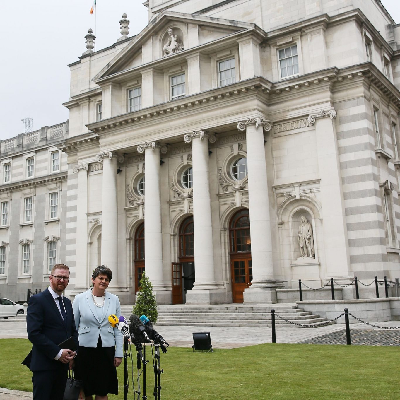 DUP leader Arlene Foster and DUP's Simon Hamilton outside Government Buildings in Dublin (Brian Lawless/PA)