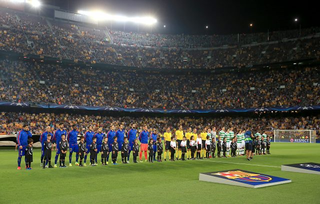 Celtic and Barcelona players line up for the Champions League anthem at the Nou Camp