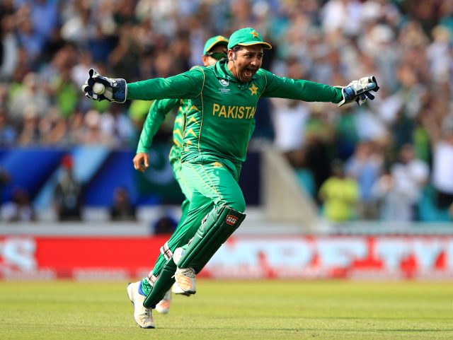 Sarfraz Ahmed celebrates after catching India's Jasprit Bumrah out to win the match during the Champions Trophy final