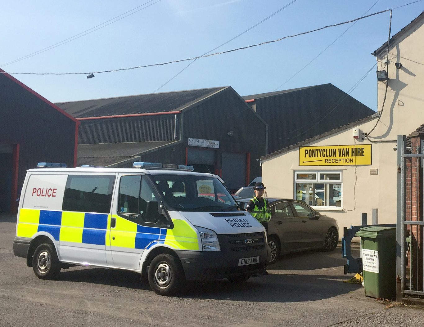 A police van outside Pontyclun Van Hire in Pontyclun, Mid Glamorgan. A van hired from the company was found in Finsbury Park (Claire Hayhurst/PA)