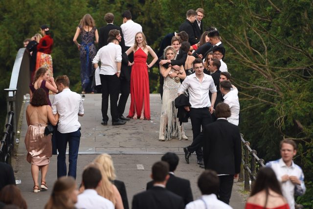 Students make their way home after attending a May Ball at Cambridge University
