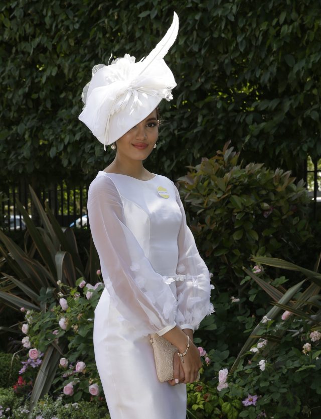 Stephanie Del Valle, the current Miss World, poses for photographers at Royal Ascot (Alastair Grant/AP)
