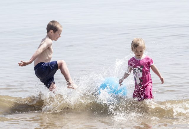 Children enjoy the beach in Scarborough. (Danny Lawson/PA)