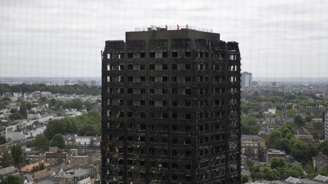The PM apologised for the failures by local and national government in responding to the Grenfell Tower fire (Matt Dunham/AP)