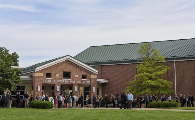Mourners line up for the funeral of Otto Warmbier (Bryan Woolston/AP)