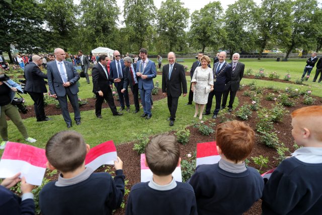 His Serene Highness Albert II, Prince of Monaco chats with local school children as he inaugurates The Princess Grace Rose Garden in St. Dominick's Park (Niall Carson/PA)