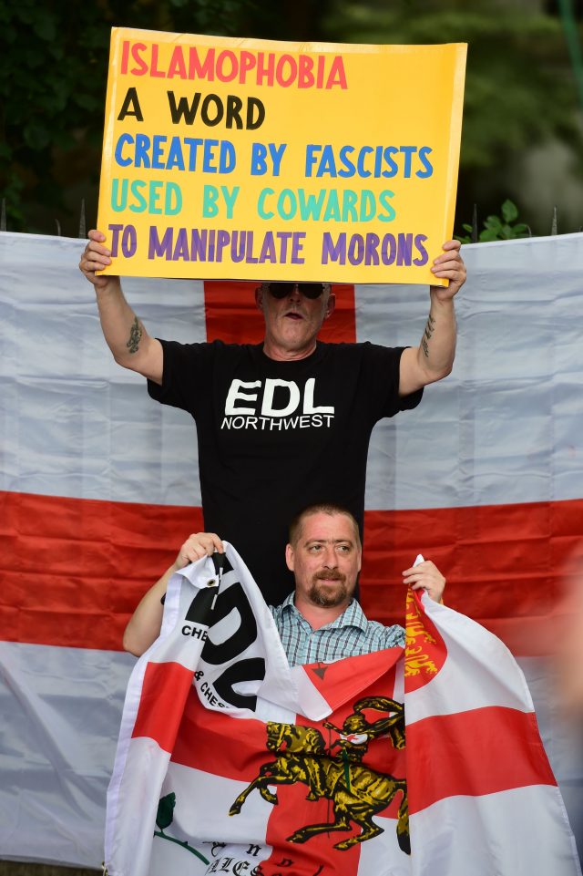 People take part in an English Defence League (EDL) protest in central London (David Mirzoeff/PA)