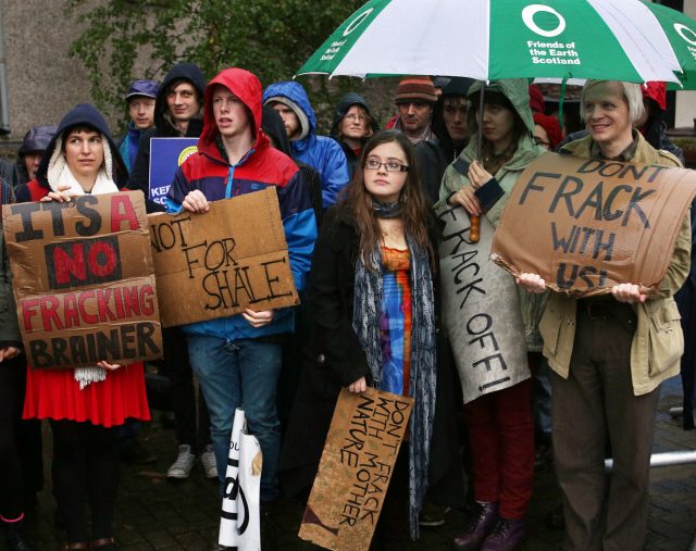 Protesters take part in an anti-fracking demonstration outside the SNP conference in 2013