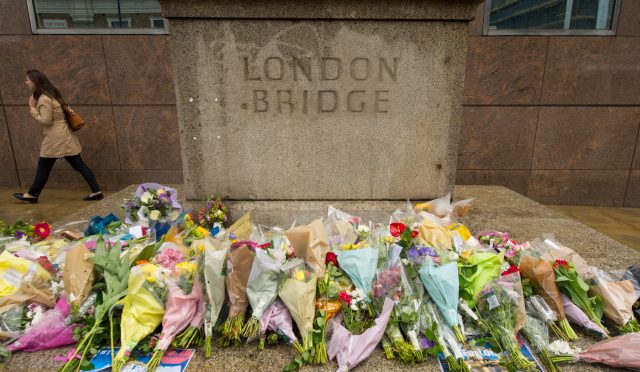 Flowers left on London Bridge for the victims of the terrorist attack (Dominic Lipinski/PA)