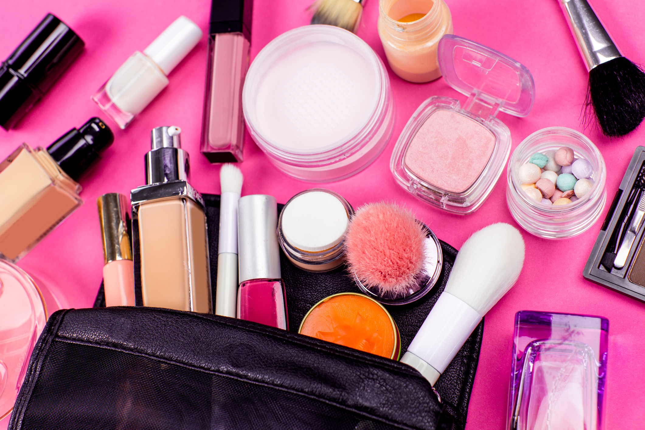 Set of colourful cosmetics on pink table (Thinkstock/PA)