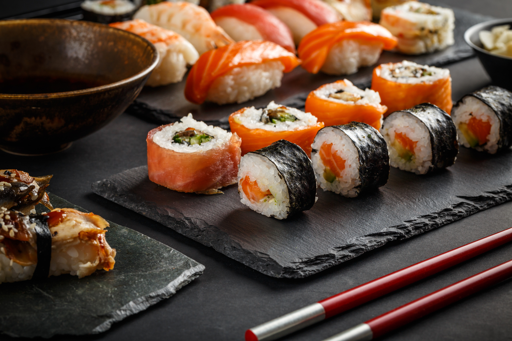 Various kinds of sushi served on black stone (Thinkstock/PA)
