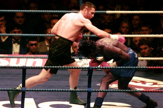 Steve Collins and Nigel Benn fight for the WBO World super middleweight title in 1996