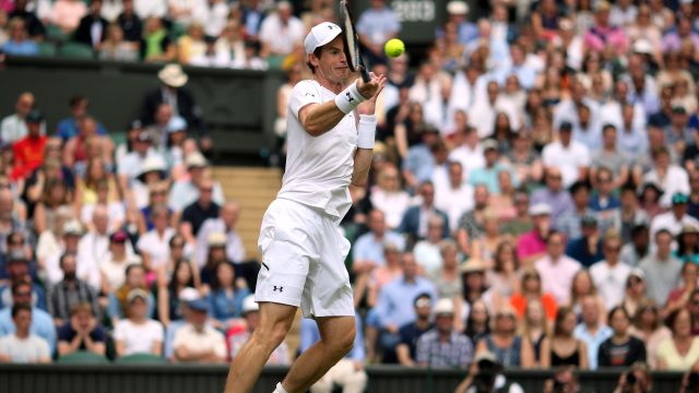 Andy Murray deals with a high bounce off Wimbledon's centre court during his first round win over Alexander Bublik