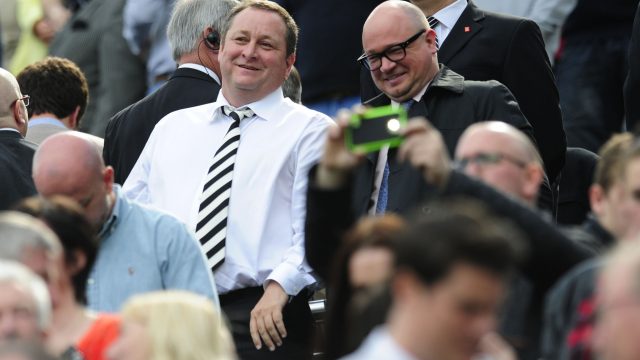 Mike Ashley watching Newcastle United, the club he owns