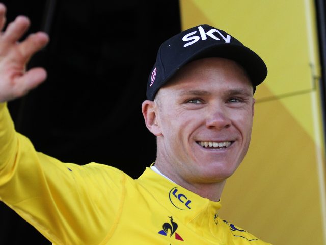 Chris Froome celebrates after stage five (Christophe Ena/AP)