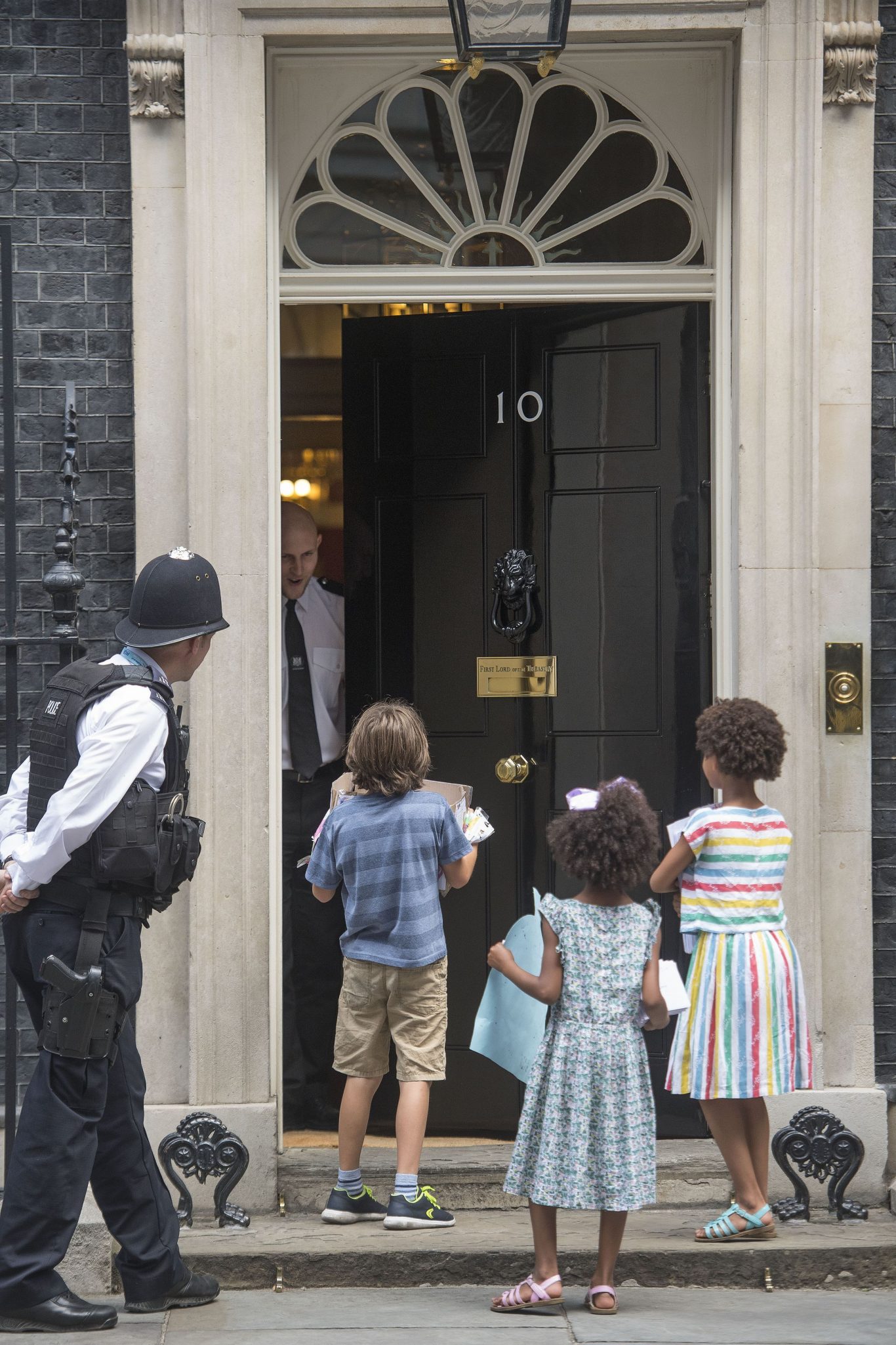 The door to 10 Downing Street is opened (Victoria Jones/PA)