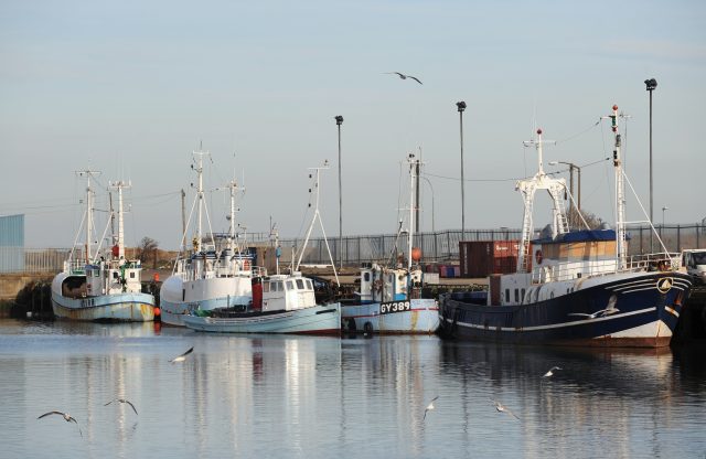 Fishing trawlers in harbour. (Anna Gowthorpe/PA)