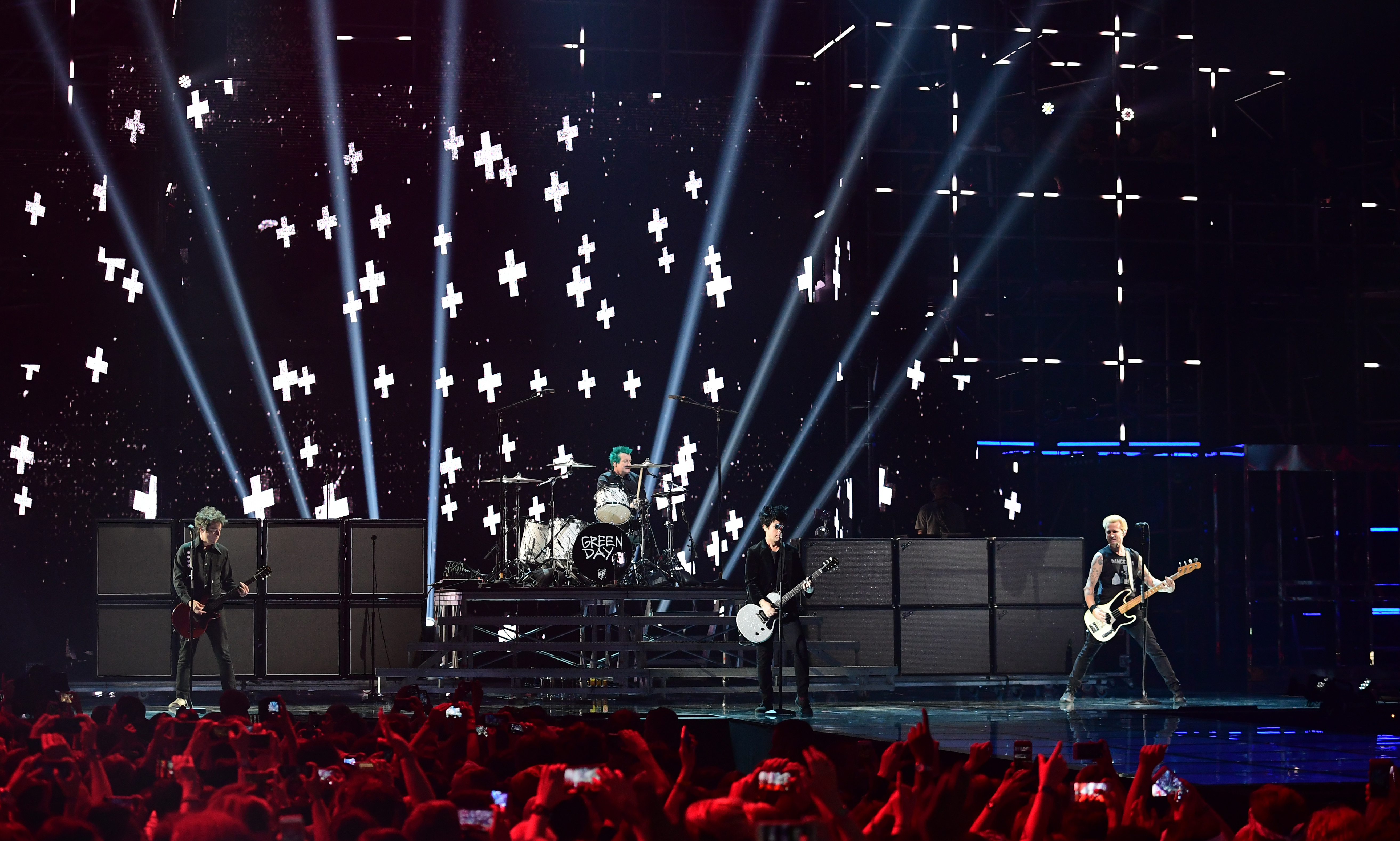 Green Day performing at an awards ceremony (Ian West/PA)