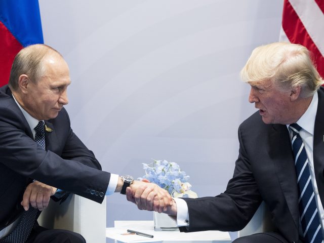Russian president Vladimir Putin with US counterpart Donald Trump (Marcellus Stein/AP)