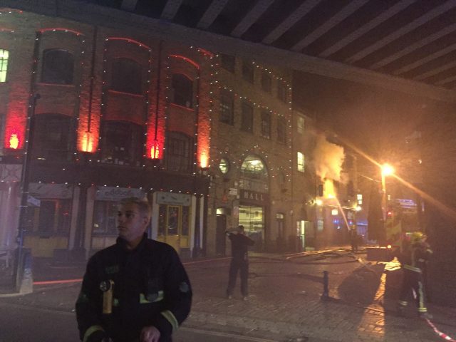 Firefighters attempt to control the fire in Camden Market
