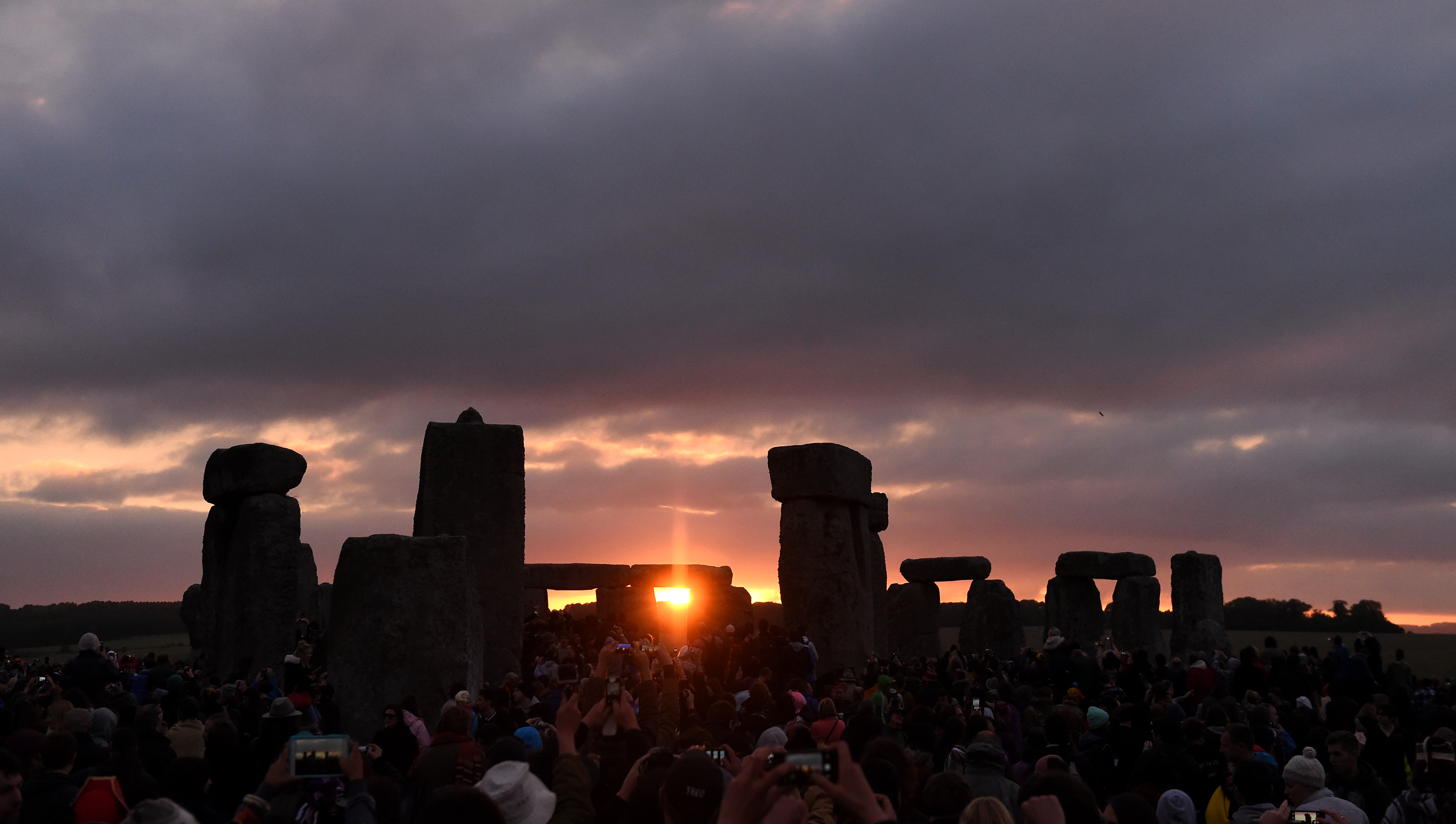 The sun rising at Stonehenge (Andrew Matthews/PA)