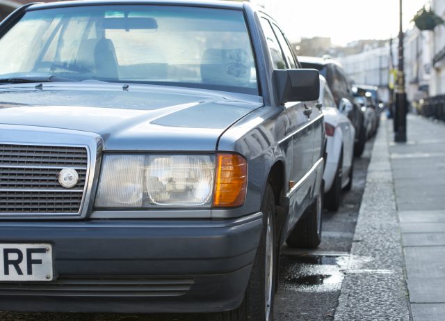 Cars parked in a street (Lauren Hurley/PA)