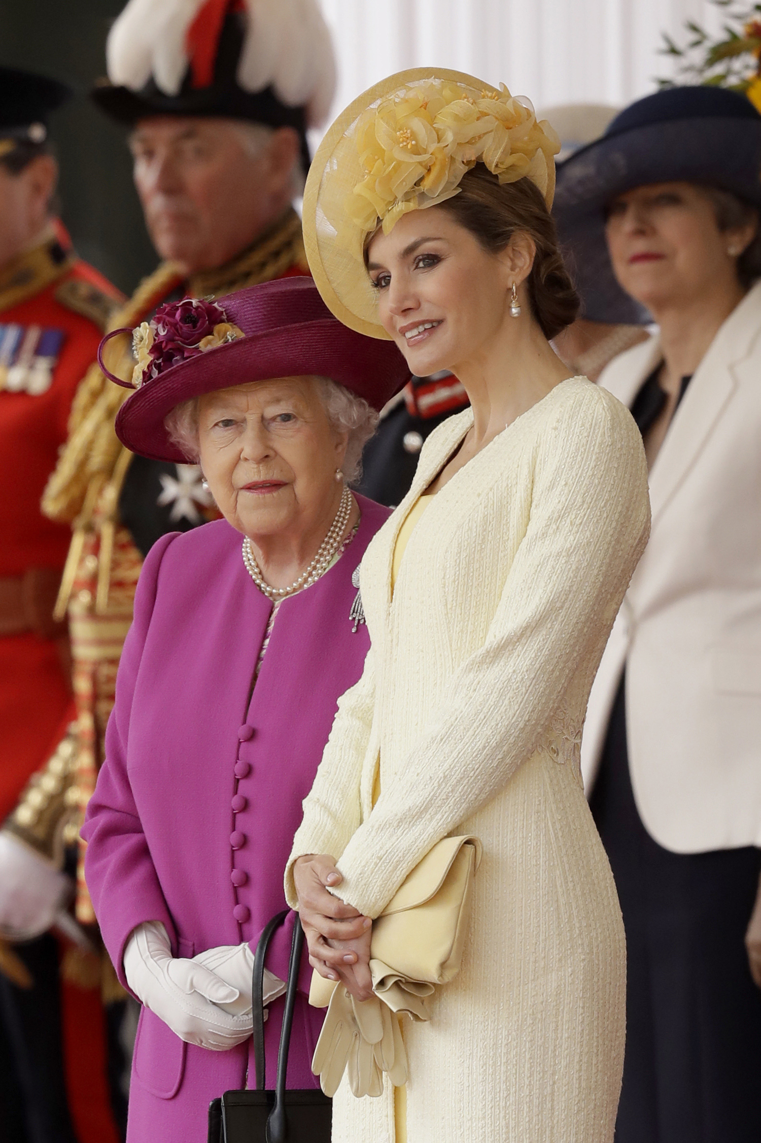 Britain's Queen Elizabeth II stands with Spain's Queen Letizia (Matt Dunham/AP)