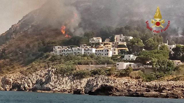 Woodland fires burn near a tourist resort in the Sicilian town of San Vito lo Capo