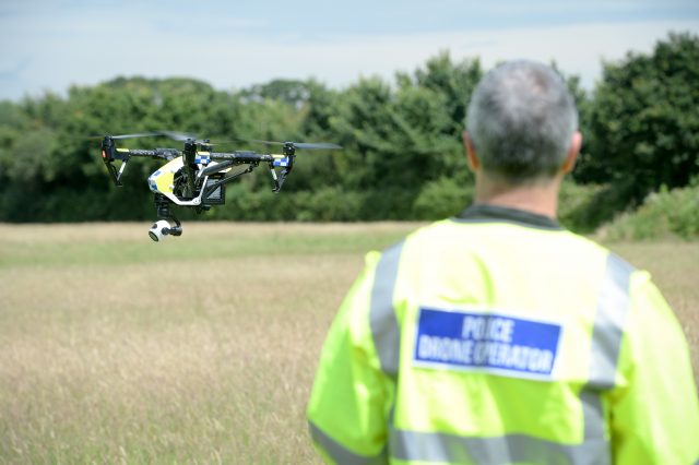 A DJI Inspire Police Drone flies (Ben Birchall/PA)