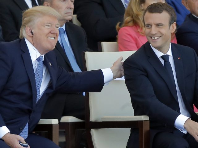 The leaders watched the parade on the Champs Elysees (Michel Euler/AP)