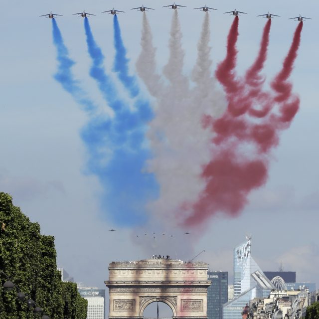 A flypast over the Arc de Triomphe (Markus Schreiber/AP)