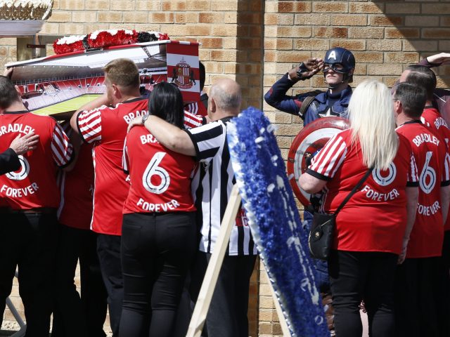 A salute for Bradley from Captain America (Owen Humphreys/PA)
