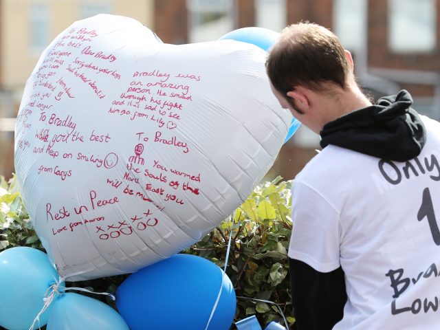 Tributes along the funeral route (Owen Humphreys/PA)
