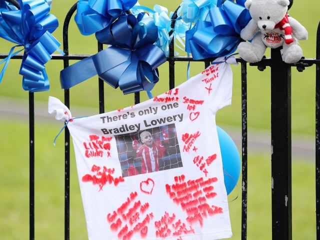 Tributes placed ahead of the funeral (Owen Humphreys/PA)
