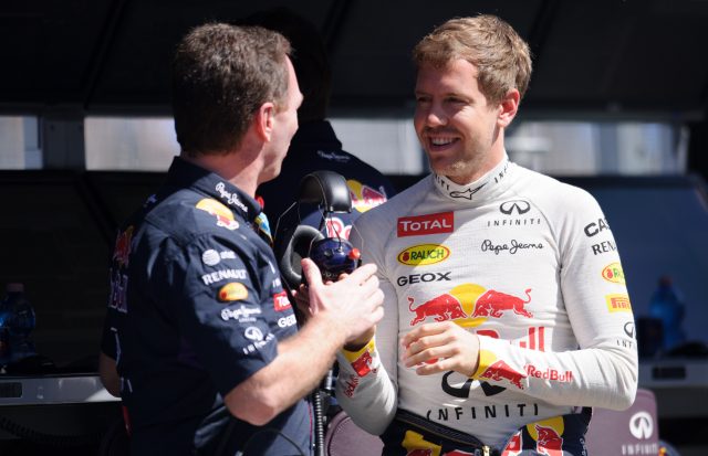 Sebastian Vettel and Christian Horner talk to each other