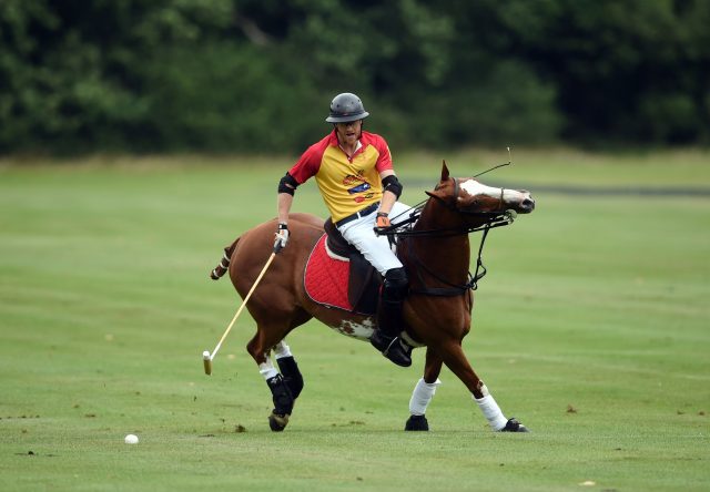 Prince Harry takes part in the Jerudong Trophy charity polo match at Cirencester Park Polo Club. PRESS ASSOCIATION Photo. Picture date: Saturday July 15, 2017. Photo credit should read: Joe Giddens/PA Wire