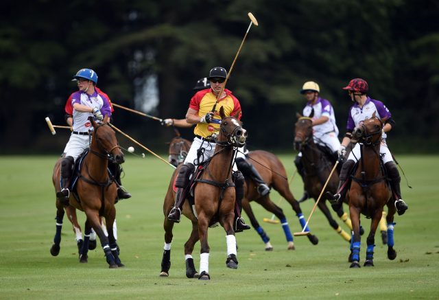 The Duke of Cambridge (centre) takes part in the Jerudong Trophy charity polo match at Cirencester Park Polo Club. PRESS ASSOCIATION Photo. Picture date: Saturday July 15, 2017. Photo credit should read: Joe Giddens/PA Wire