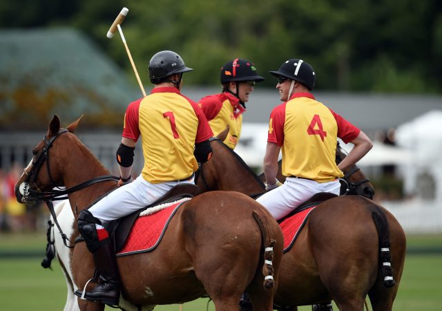 Prince Harry (left) and The Duke of Cambridge (right) take part in the Jerudong Trophy charity polo match at Cirencester Park Polo Club. PRESS ASSOCIATION Photo. Picture date: Saturday July 15, 2017. Photo credit should read: Joe Giddens/PA Wire