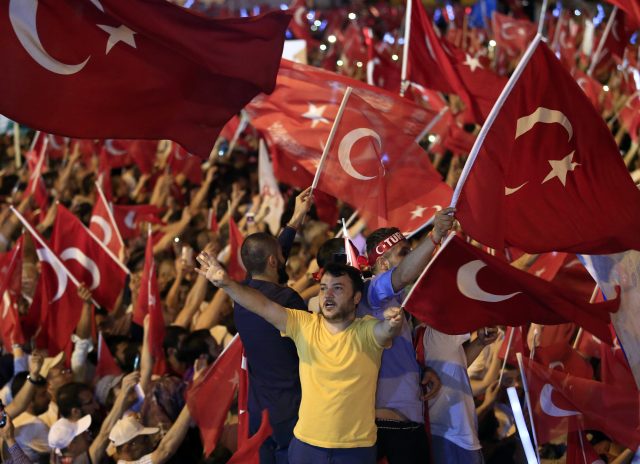 Supporters cheer as President Erdogan speaks